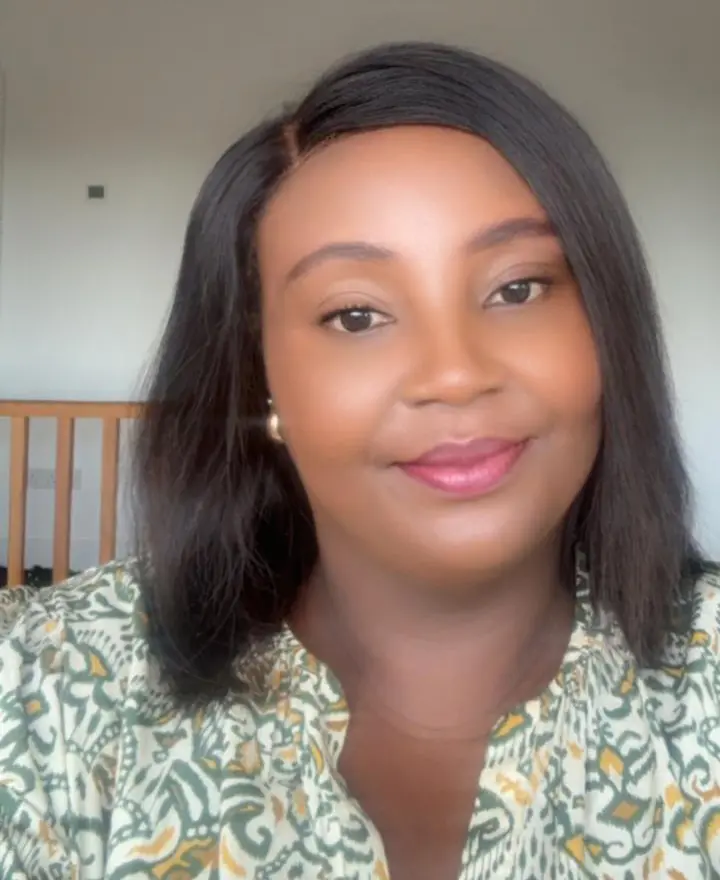 Smiling woman wearing patterned blouse
